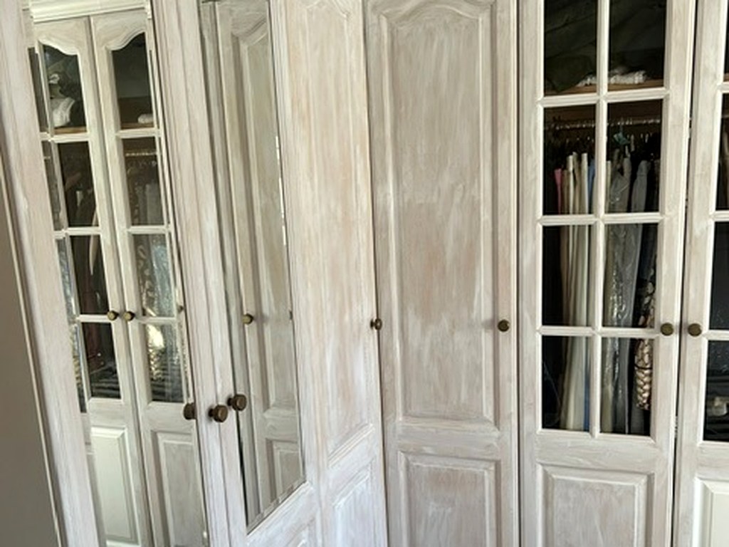 Fitted bedroom wardrobe doors sanded and primed ready for painting